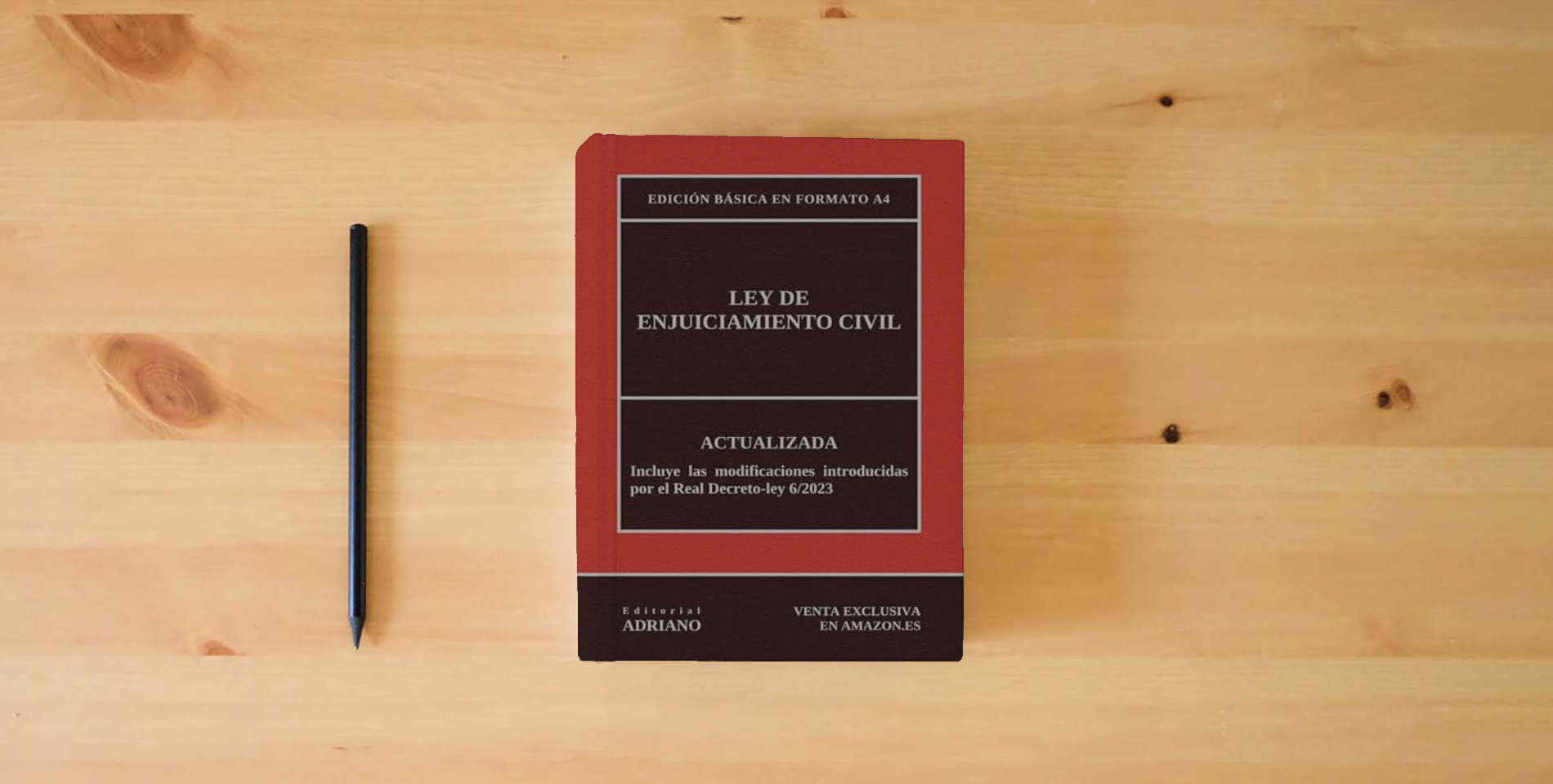 The book Ley de Enjuiciamiento Civil: Actualizada - Edición básica en formato A4 is on the table