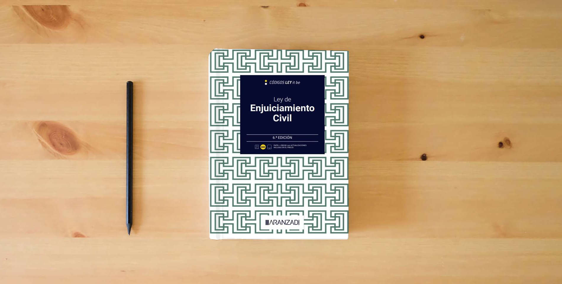 The book Ley de Enjuiciamiento Civil (LeyItBe) (Código Básico) is on the table