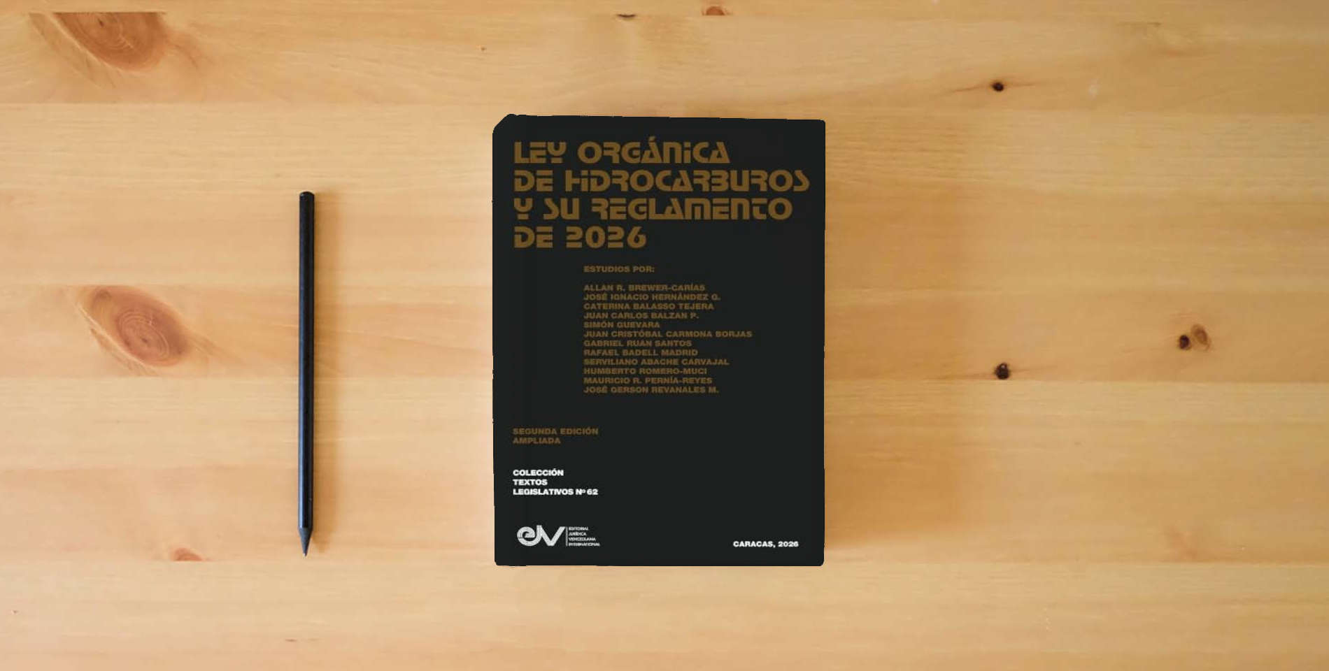 The book Ley Organica de Hidrocarburos Y Su Reglamento de 2026 is on the table