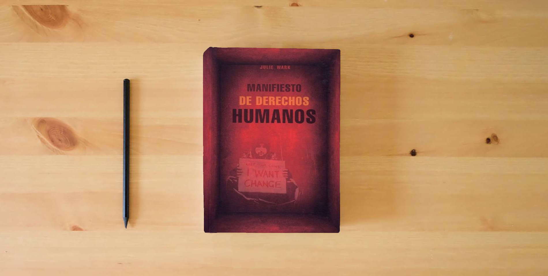 The book Manifiesto de derechos humanos (Documentos) is on the table