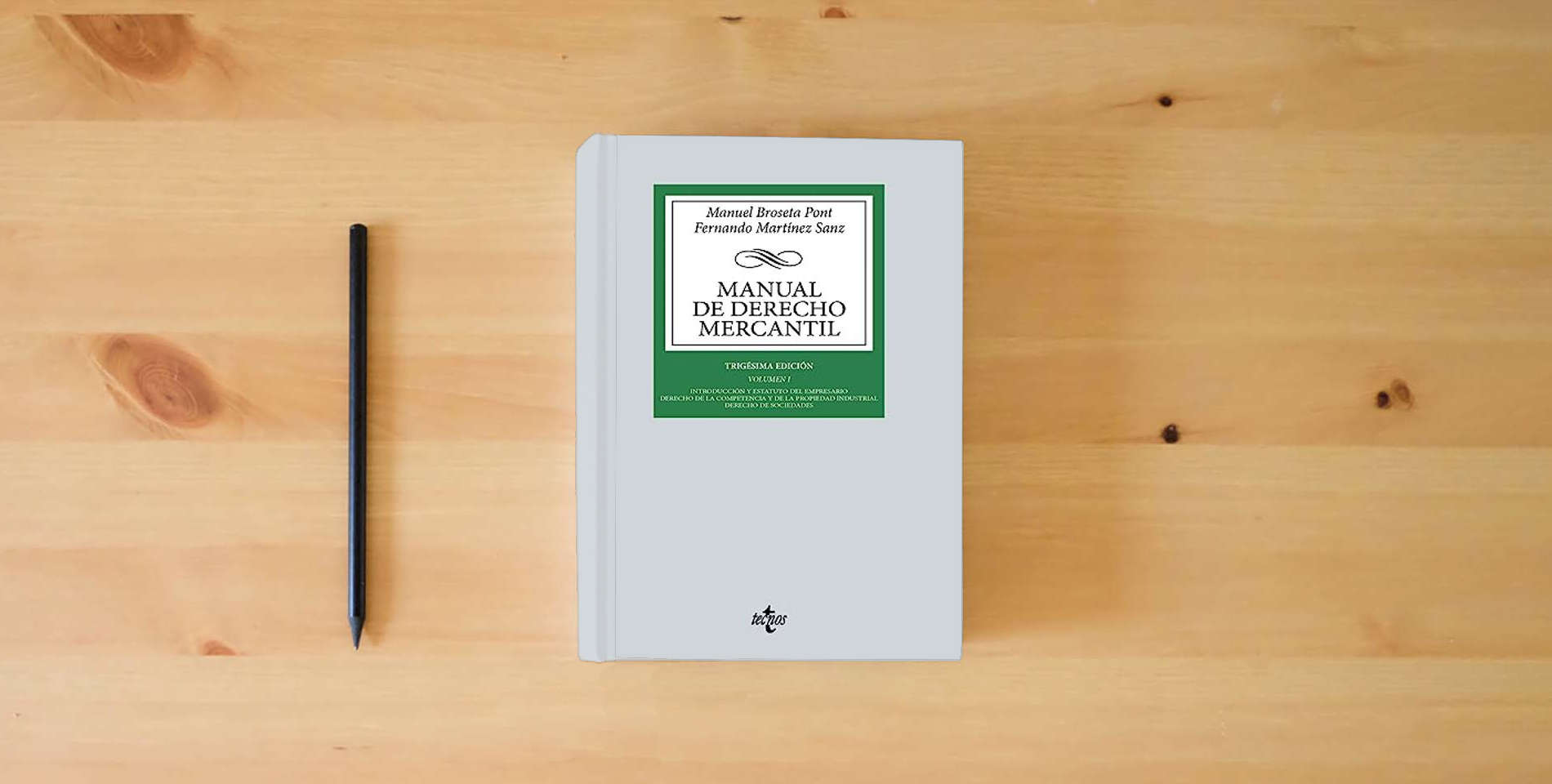 The book Manual de Derecho Mercantil: Vol. I. Introducción y estatuto del empresario. Derecho de la competencia y de la propiedad industrial. Derecho de ... Biblioteca Universitaria de Editorial Tecnos) is on the table