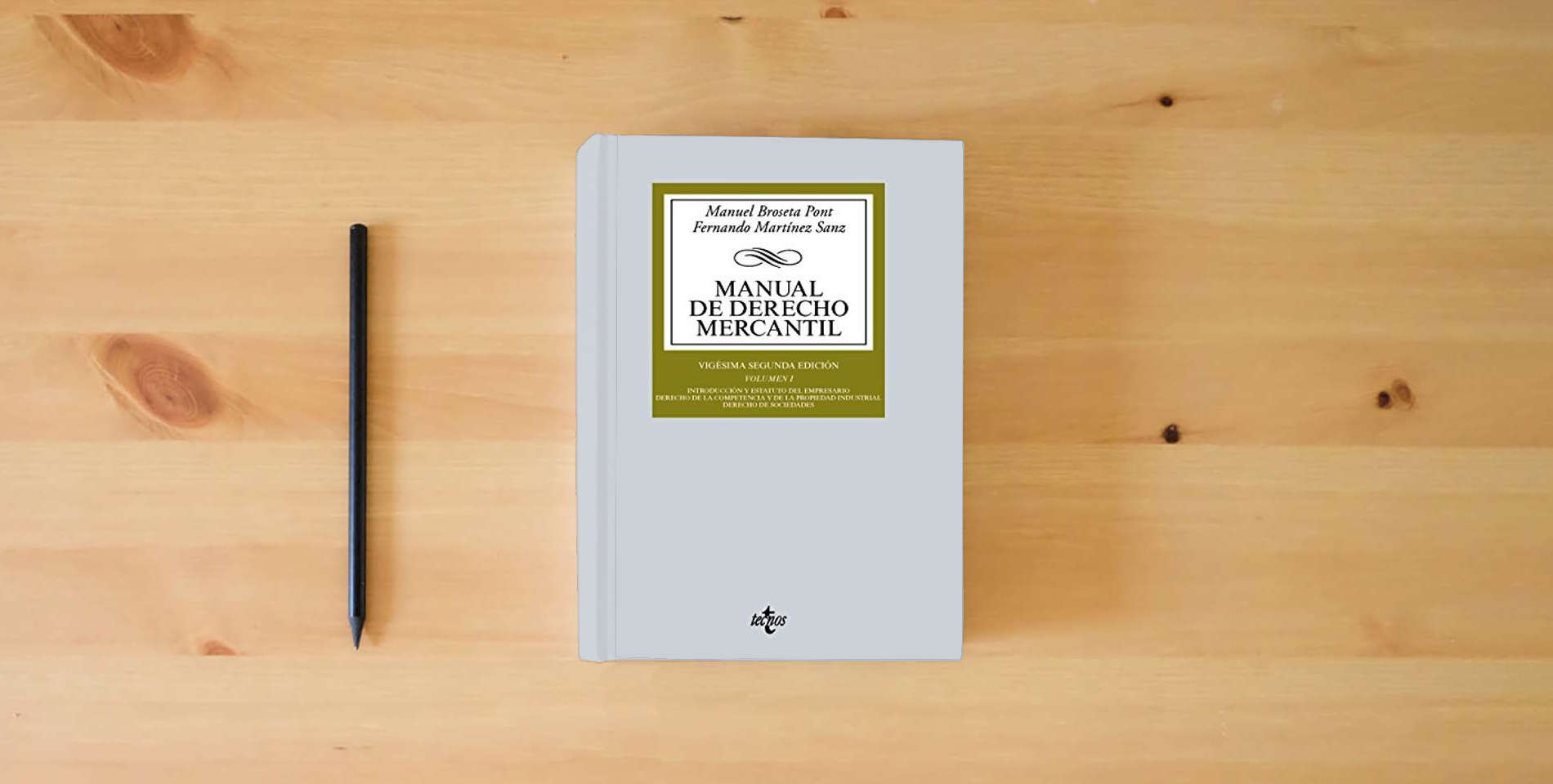 The book Manual de Derecho Mercantil: Vol. I. Introducción y estatuto del empresario. Derecho de la competencia y de la propiedad industrial. Derecho de sociedades is on the table