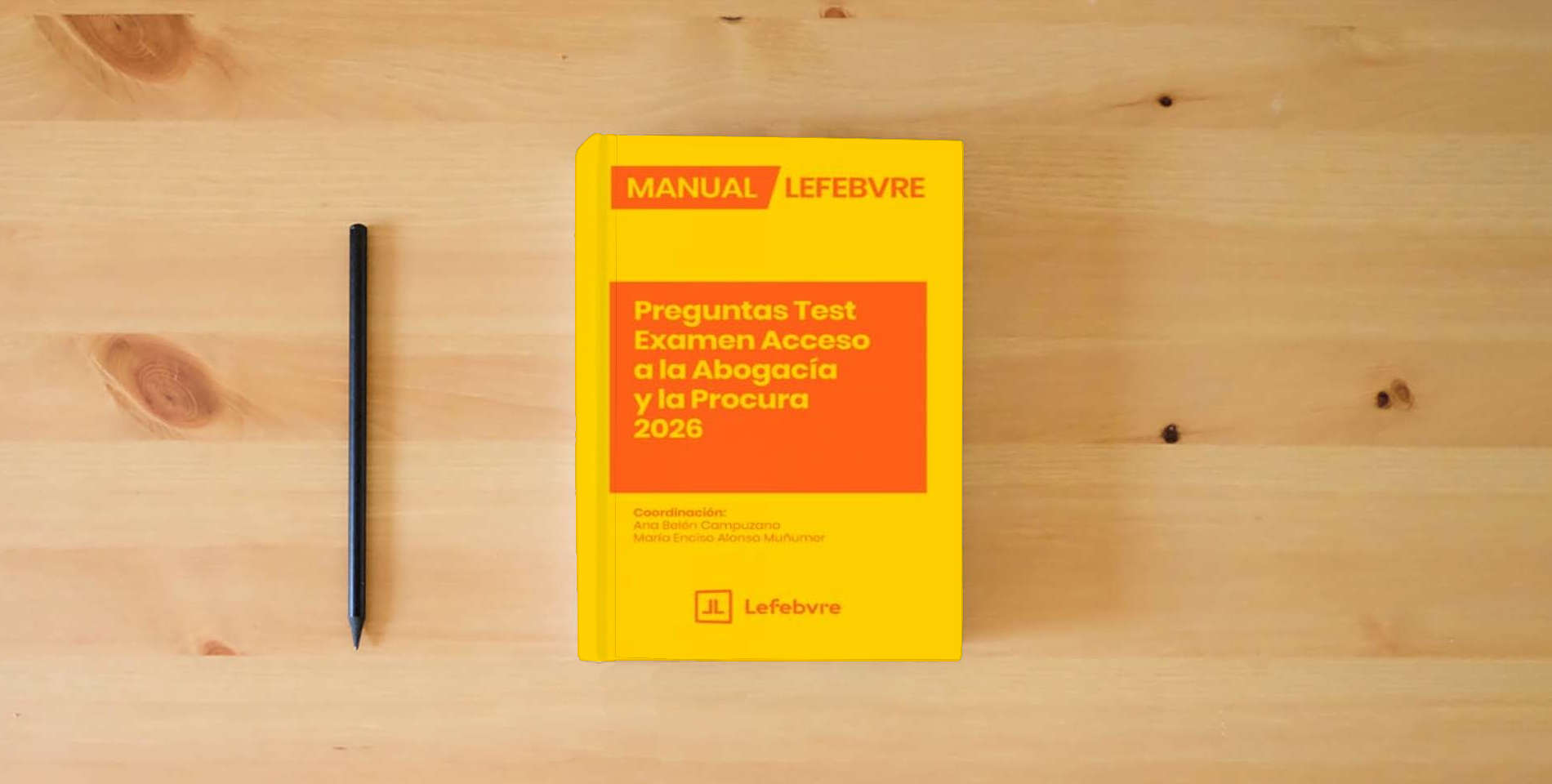 The book Manual Preguntas Test Acceso a la Abogacía y la Procura 2026 is on the table