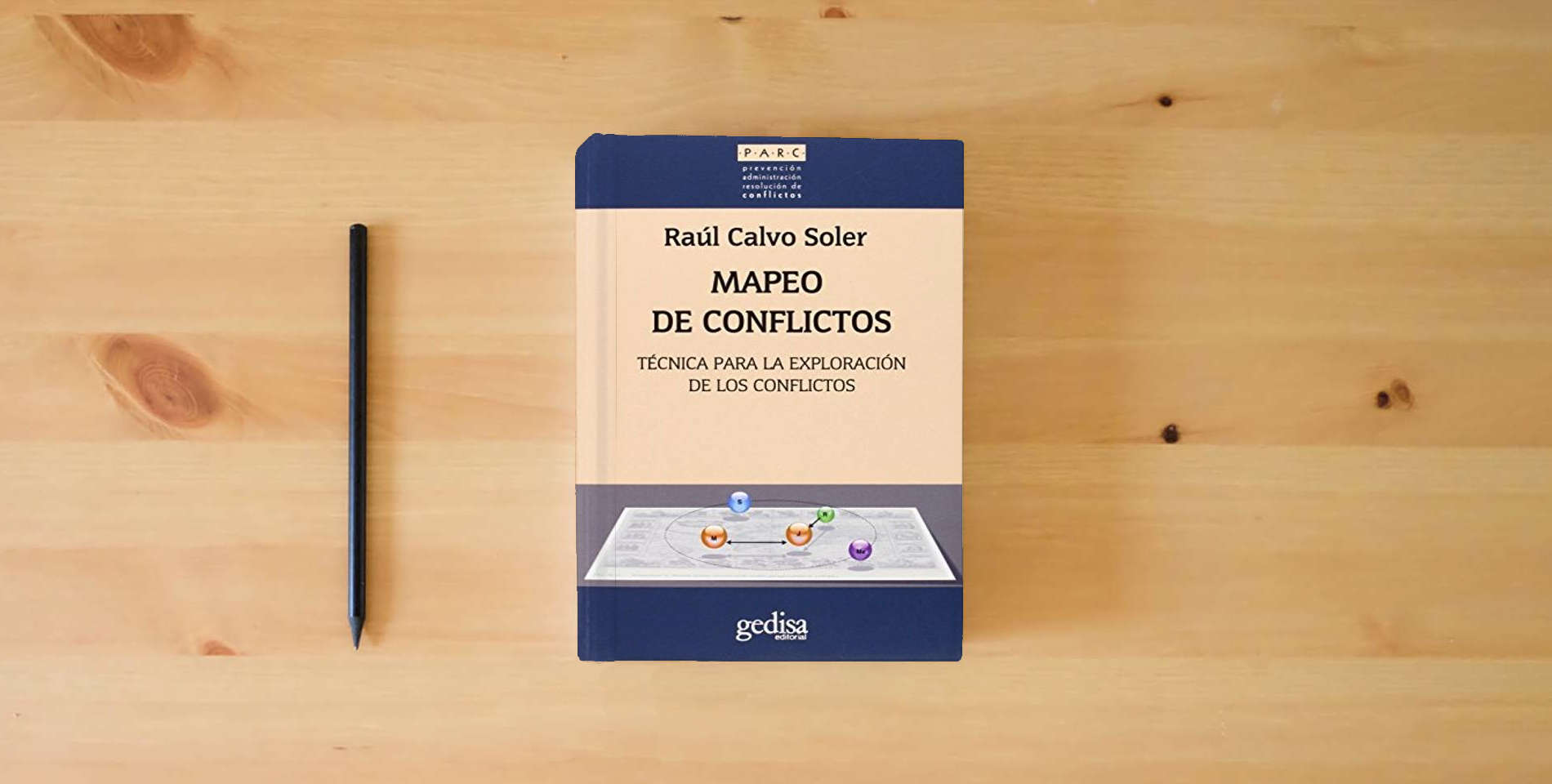 The book Mapeo de conflictos: Técnica para la exploración de los conflictos: 350012 (Prevención Administración Resolución de conflictos) is on the table