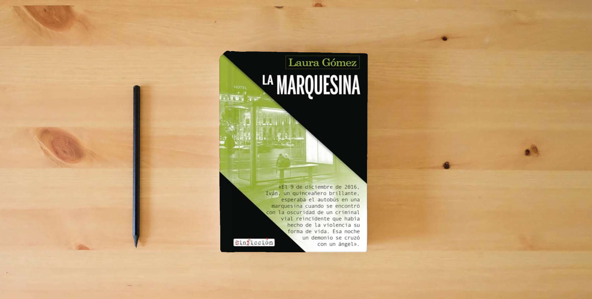 The book La marquesina (SIN FICCION) is on the table
