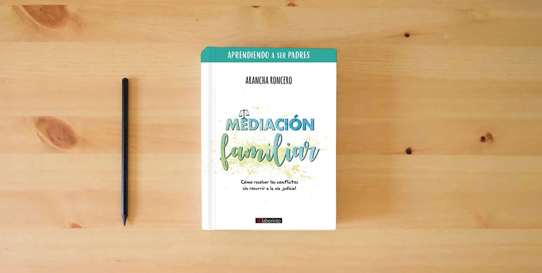 The book Mediación familiar: Cómo resolver los conflictos sin recurrir a la vía judicial: 2 (Aprendiendo a ser padres) is on the table