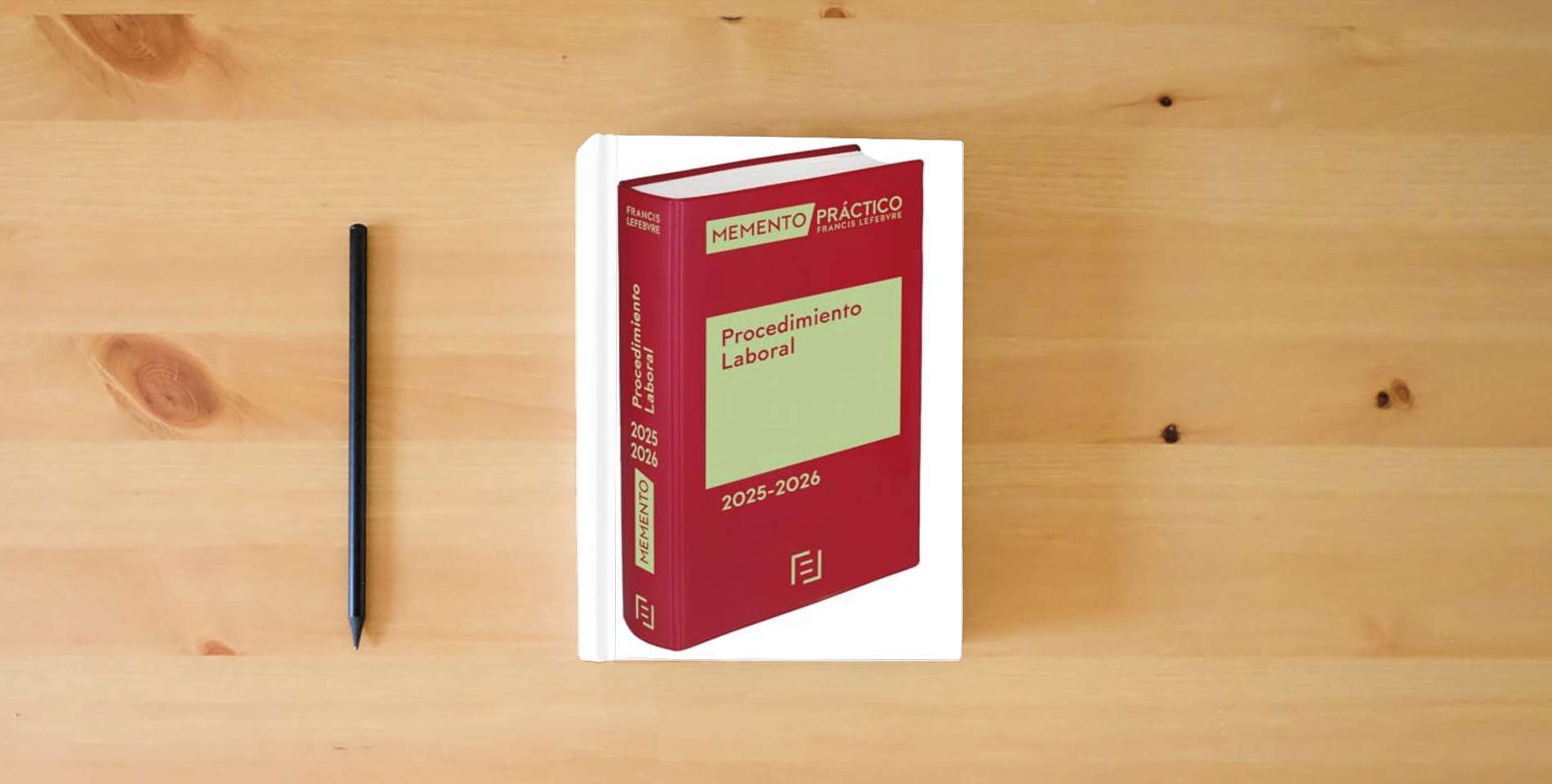 The book Memento Procedimiento Laboral 2025-2026 (MANUALES) is on the table