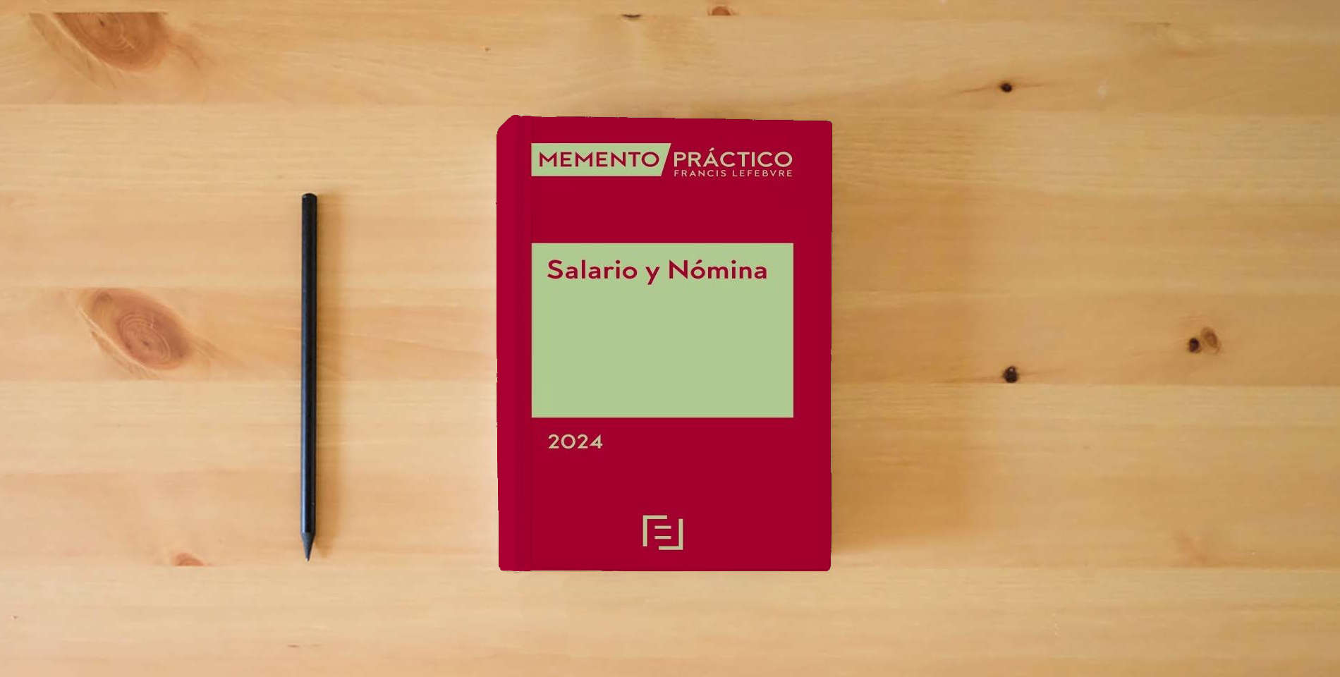 The book Memento Salario y Nómina 2024 (MANUALES) is on the table