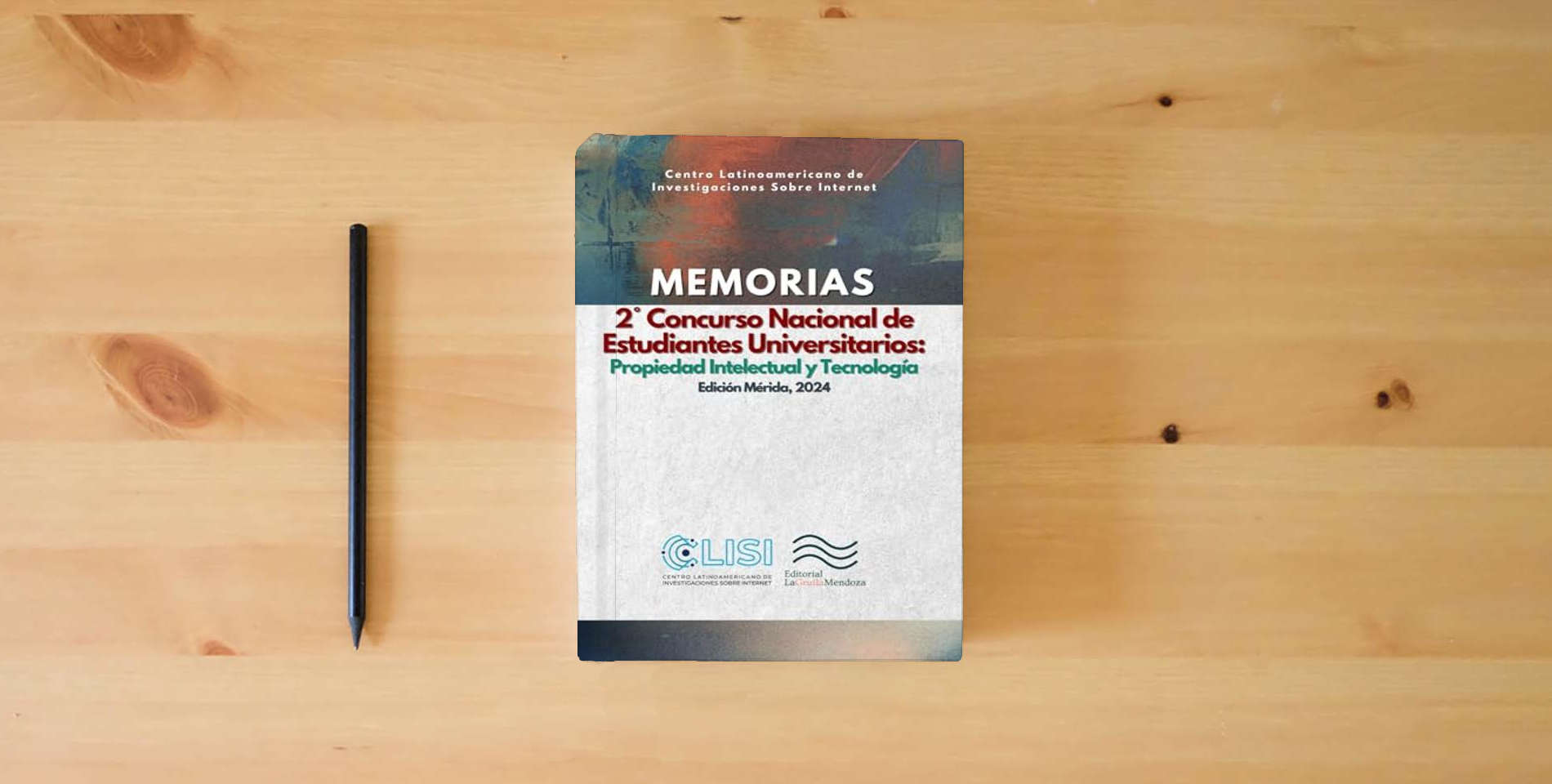 The book MEMORIAS: Copa Creative Commons: 2° Concurso Nacional de Estudiantes Universitarios: Propiedad Intelectual y Tecnología is on the table