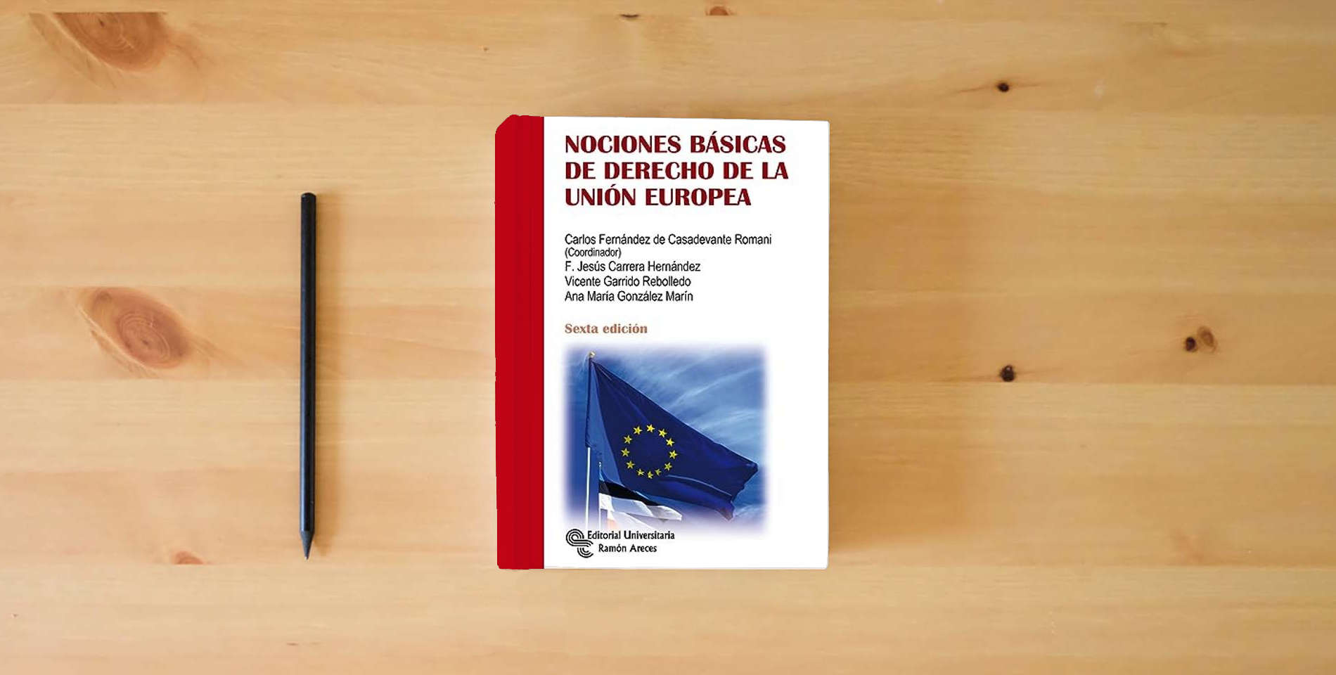 The book Nociones básicas de derecho de la Unión Europea (Manuales) is on the table