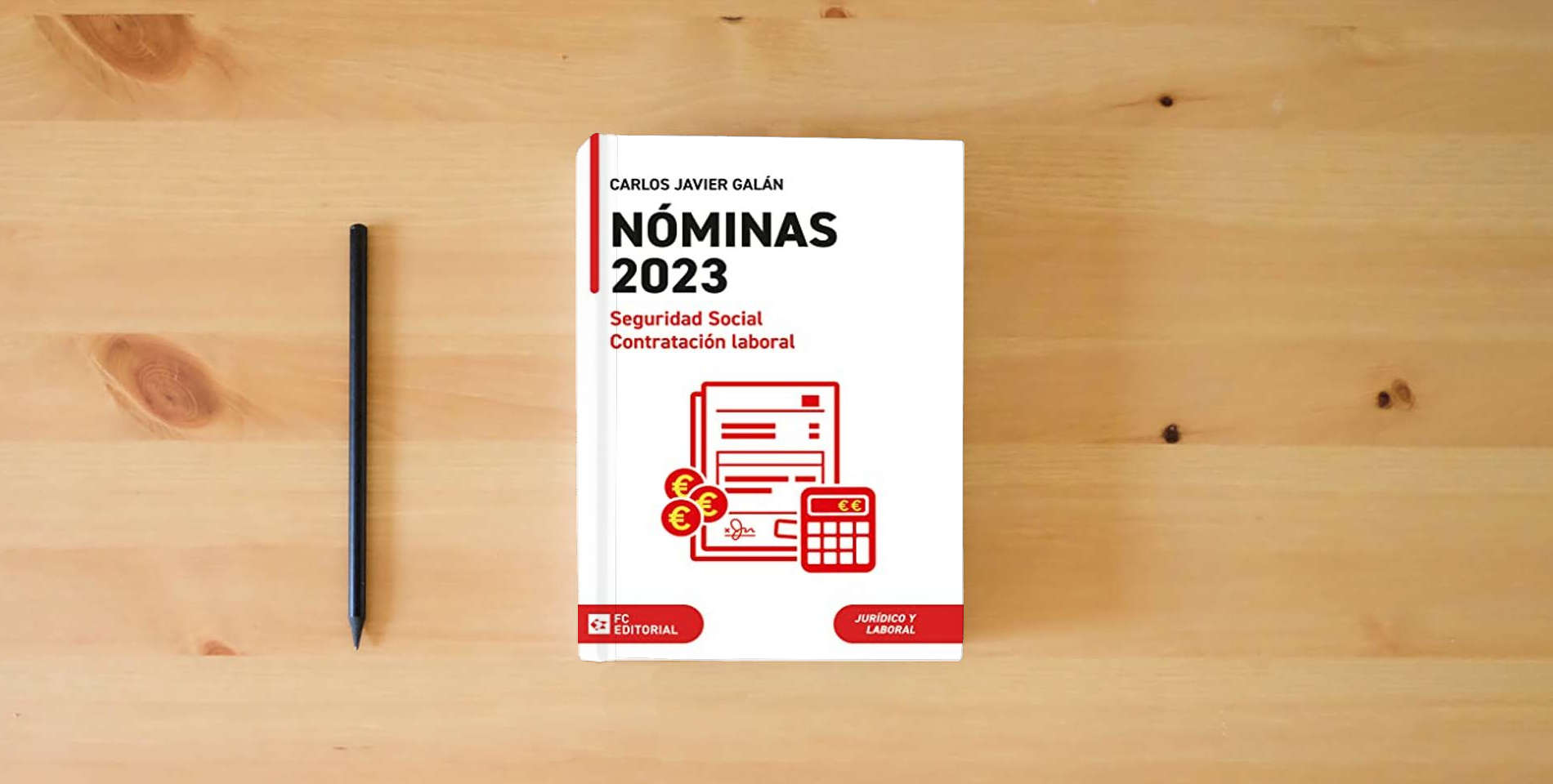 The book Nóminas, Seguridad Social y Contratación Laboral 2023 (SIN COLECCION) is on the table