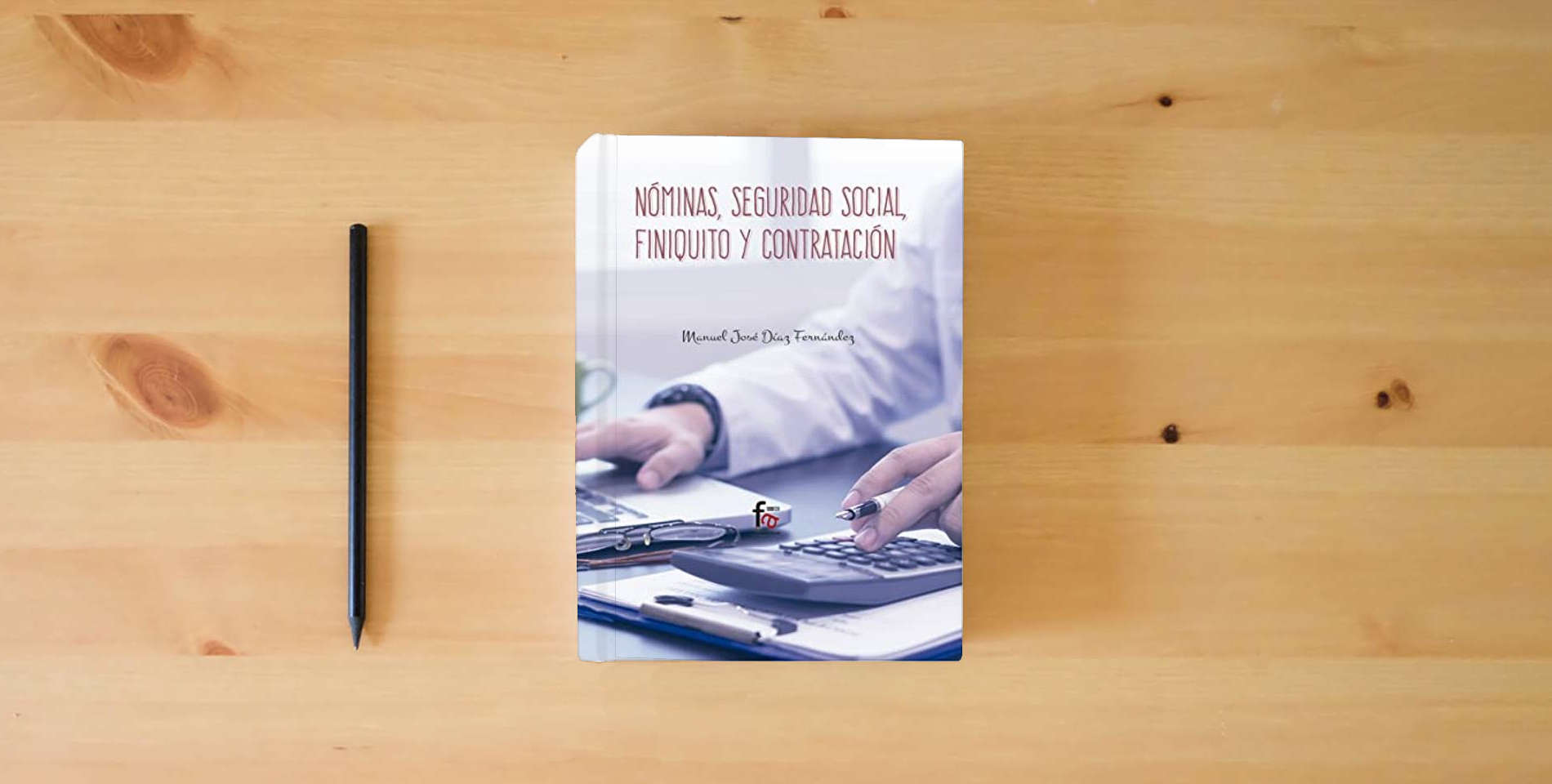 The book Nóminas, Seguridad Social, Finiquito y Contratación, Colección Empresa is on the table