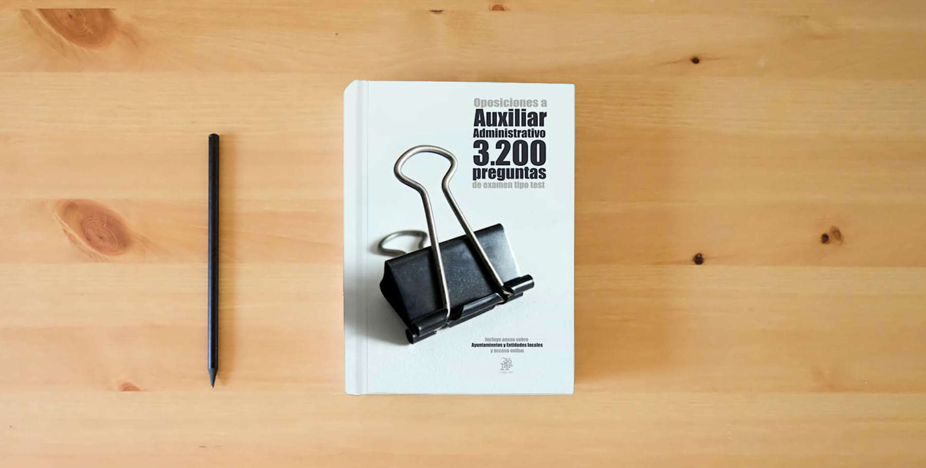 The book Oposiciones a Auxiliar Administrativo 3200 preguntas tipo test: Incluye anexo sobre Ayuntamientos y Entidades locales y acceso online is on the table