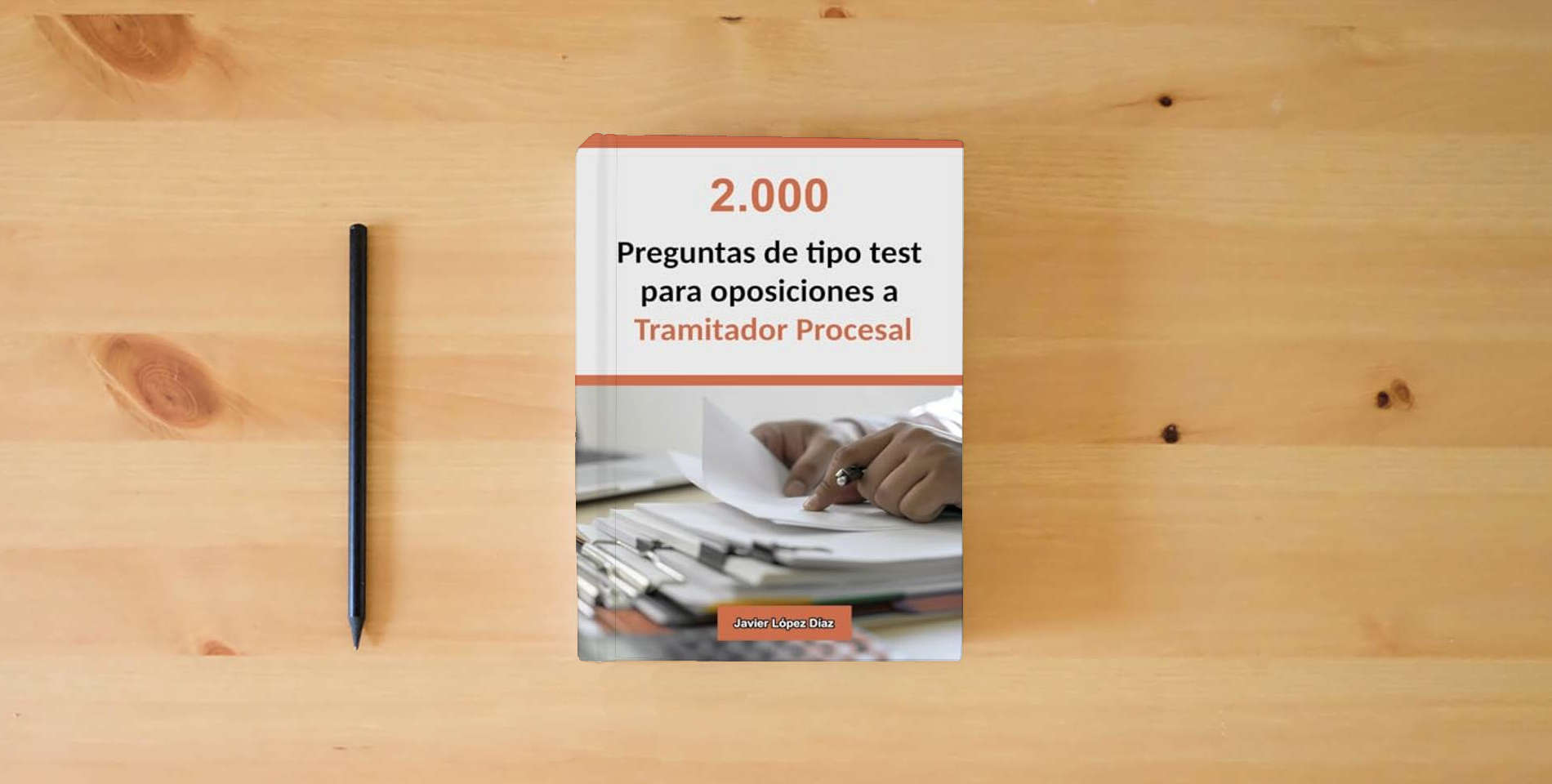The book Oposiciones a Tramitador Procesal: 2.000 Preguntas de Tipo Test Resueltas para Preparar el Examen is on the table
