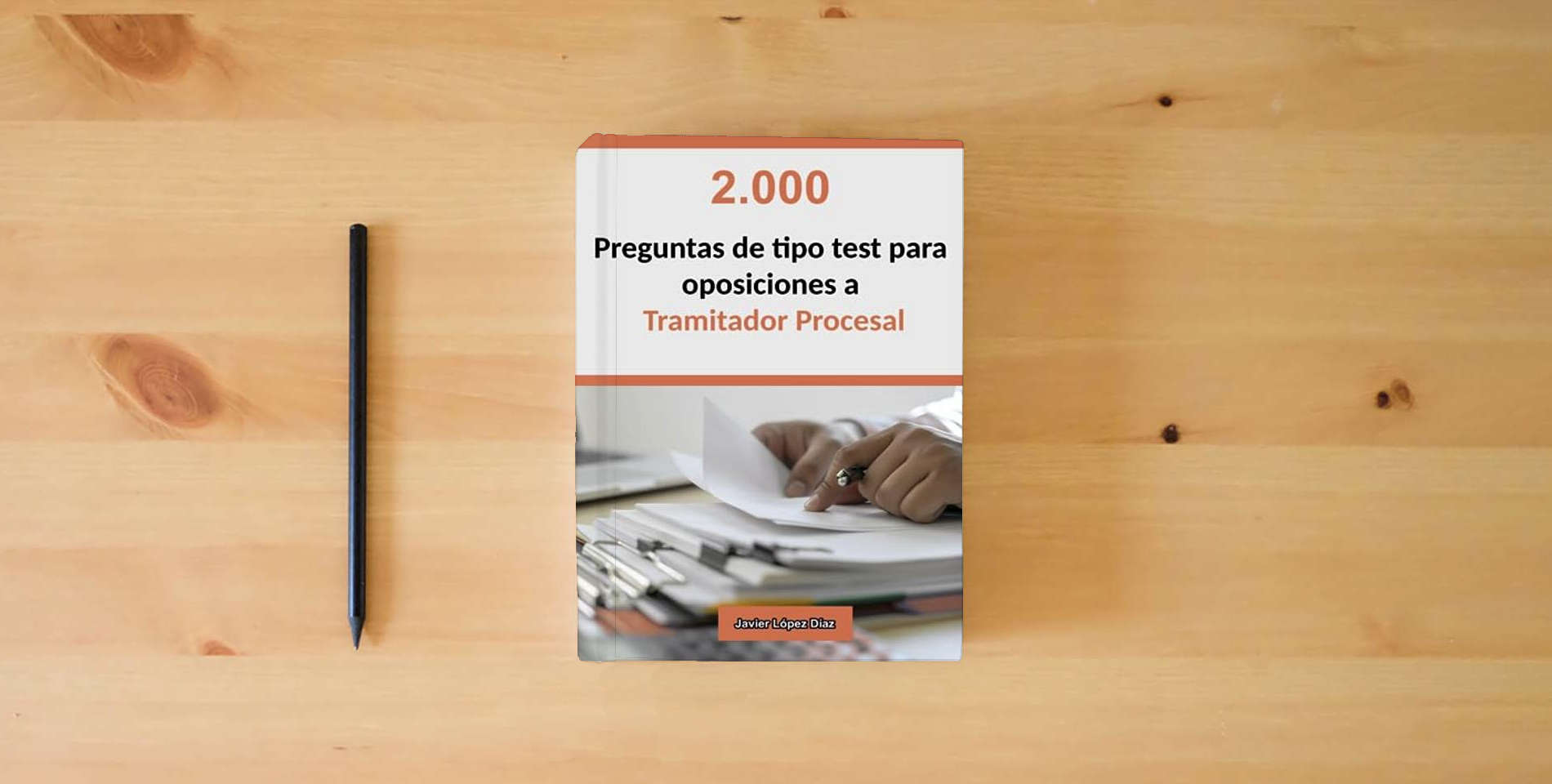 The book Oposiciones a Tramitador Procesal: 2.000 Preguntas de Tipo Test Resueltas para Preparar el Examen is on the table