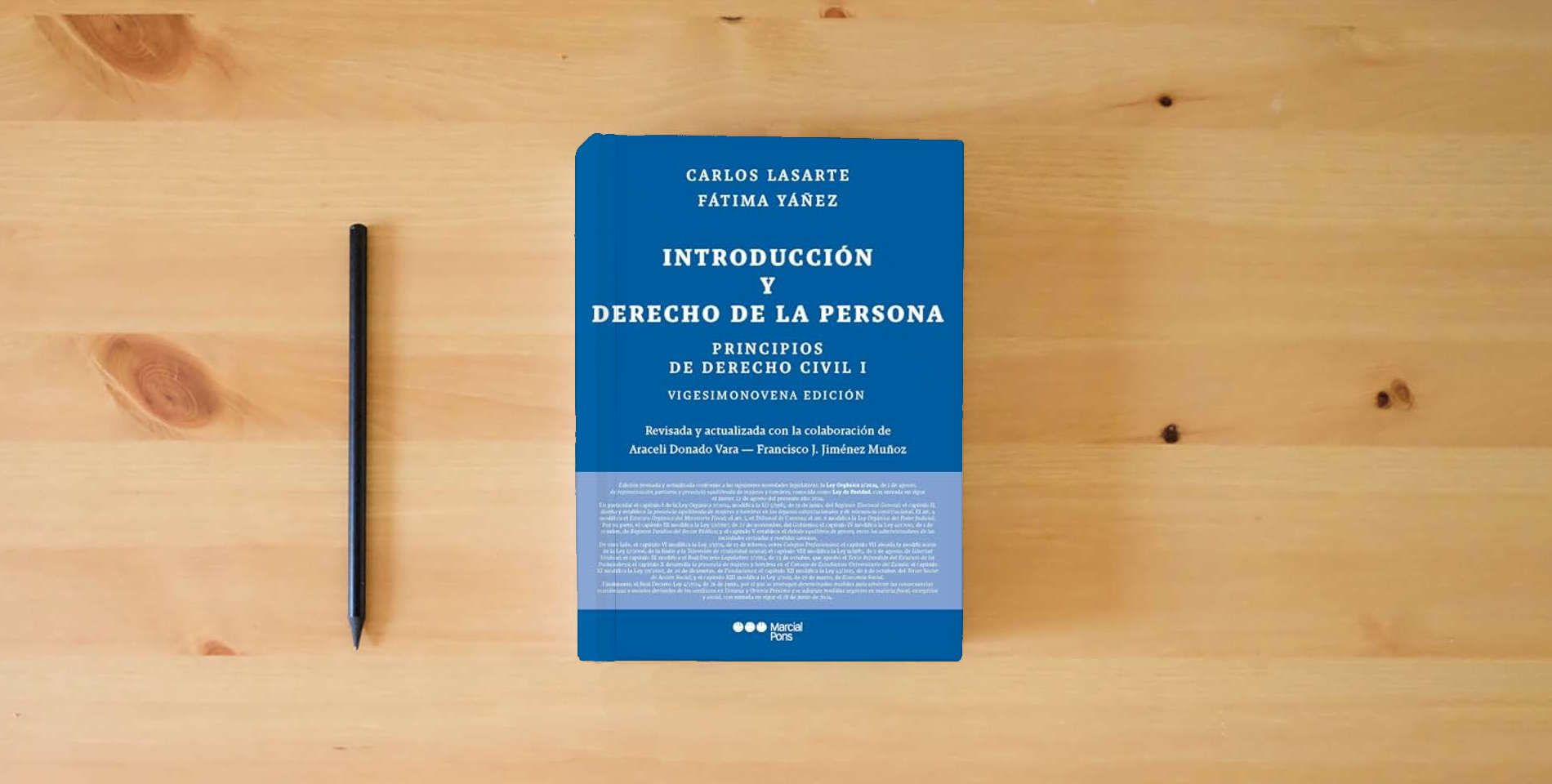 The book Principios de Derecho civil. Tomo I: Tomo I: Introducción y Derecho de la persona 28.ª ed. (Manuales universitarios) is on the table