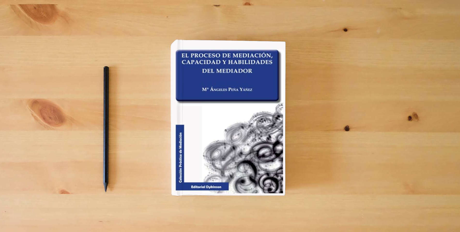 The book Proceso de mediación, capacidad y habilidades del mediador (Colección Práctica de Mediación) is on the table
