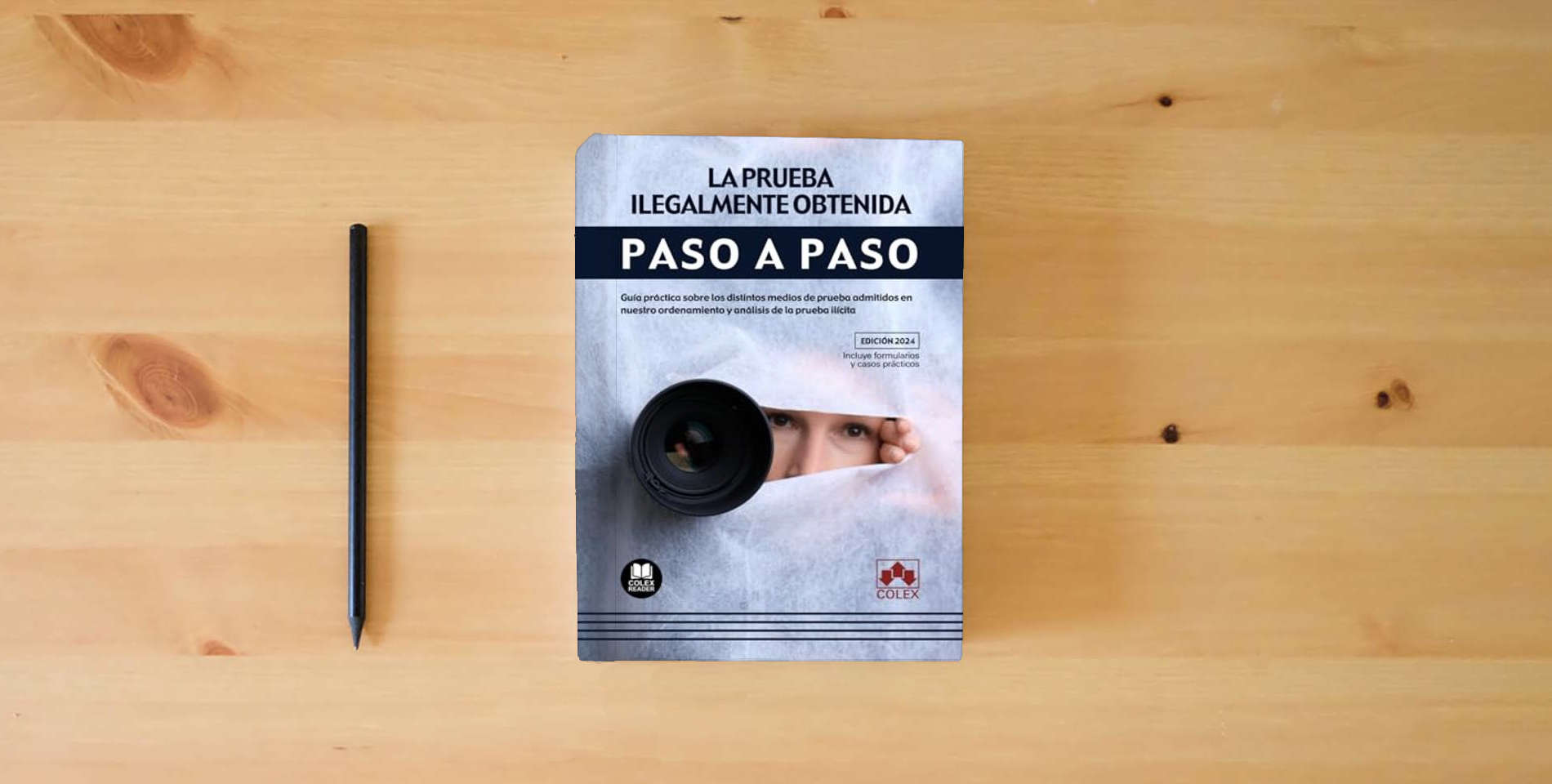The book La prueba ilegalmente obtenida. Paso a paso: Guía práctica sobre los distintos medios de prueba admitidos en nuestro ordenamiento y análisis de la prueba ilícita is on the table