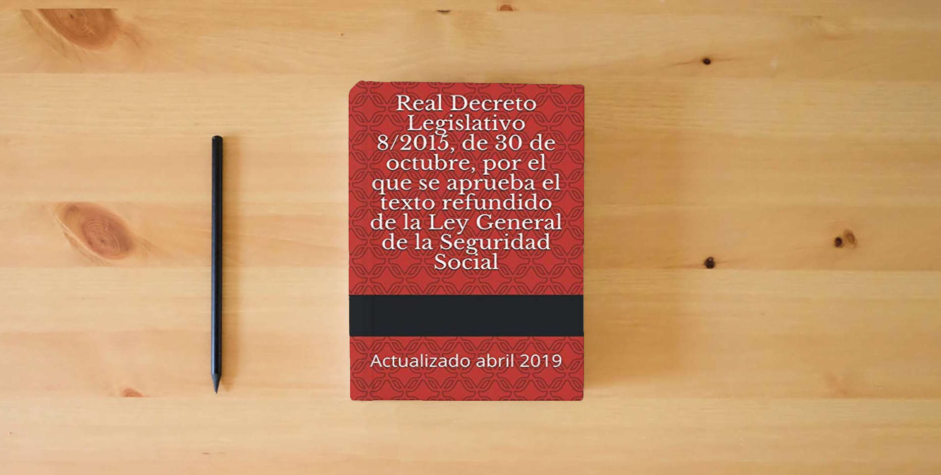 The book Real Decreto Legislativo 8/2015, de 30 de octubre, por el que se aprueba el texto refundido de la Ley General de la Seguridad Social: Actualizado abril 2019 (Códigos Básicos) is on the table