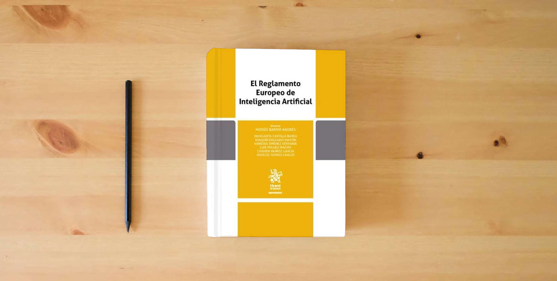 The book El Reglamento Europeo de Inteligencia Artificial (Reformas) is on the table