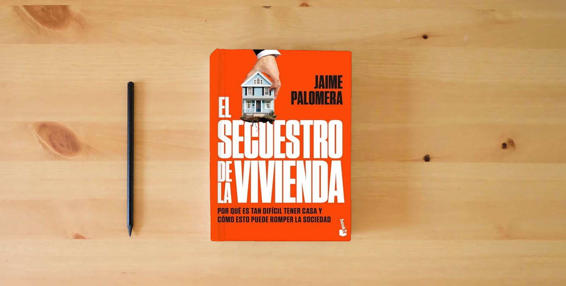 The book El secuestro de la vivienda: Por qué es tan difícil tener casa y cómo esto puede romper la sociedad (Actualidad) is on the table