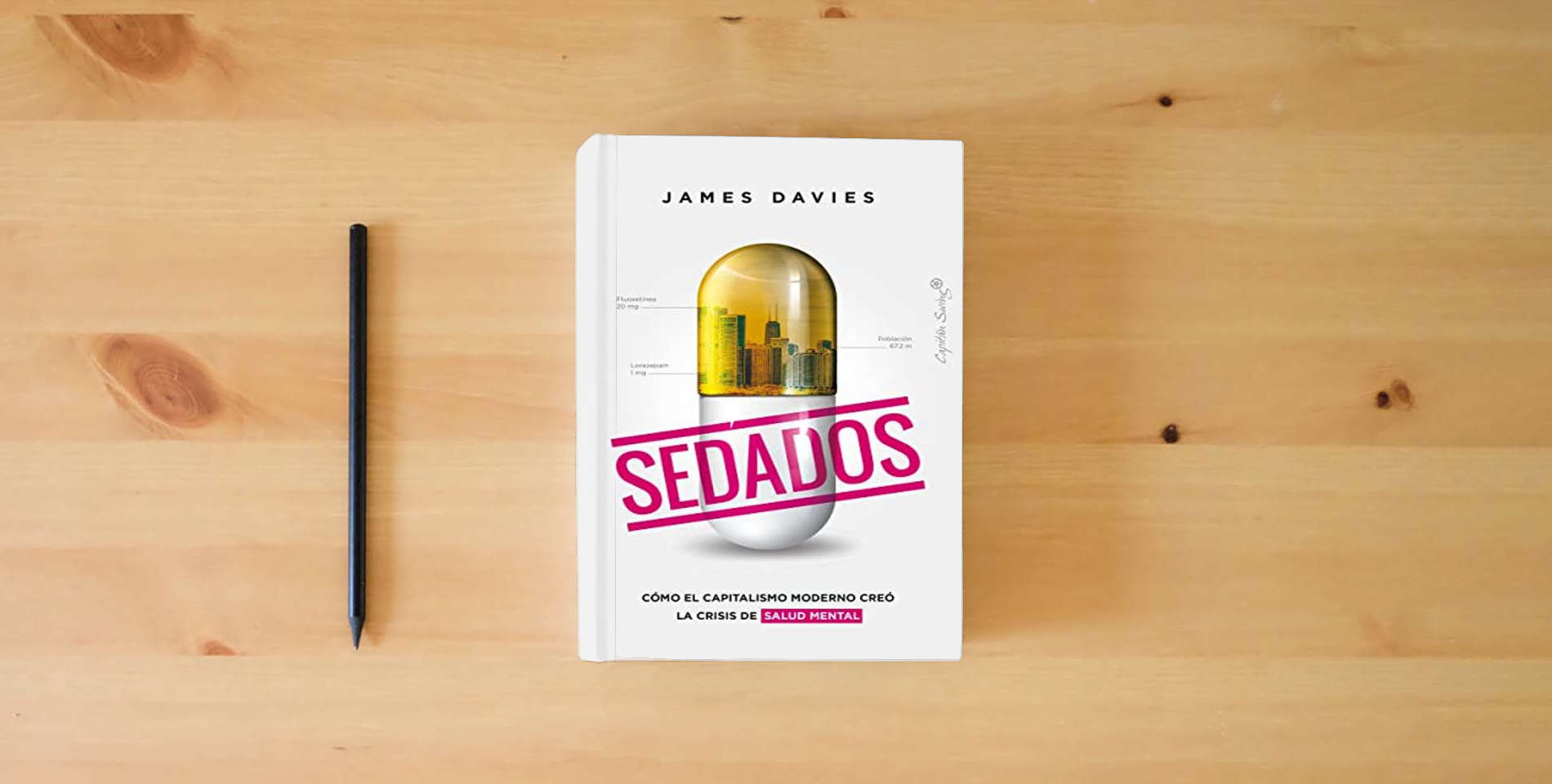The book Sedados (2ª ED): Cómo el capitalismo moderno creó la crisis de salud mental (ENSAYO) is on the table