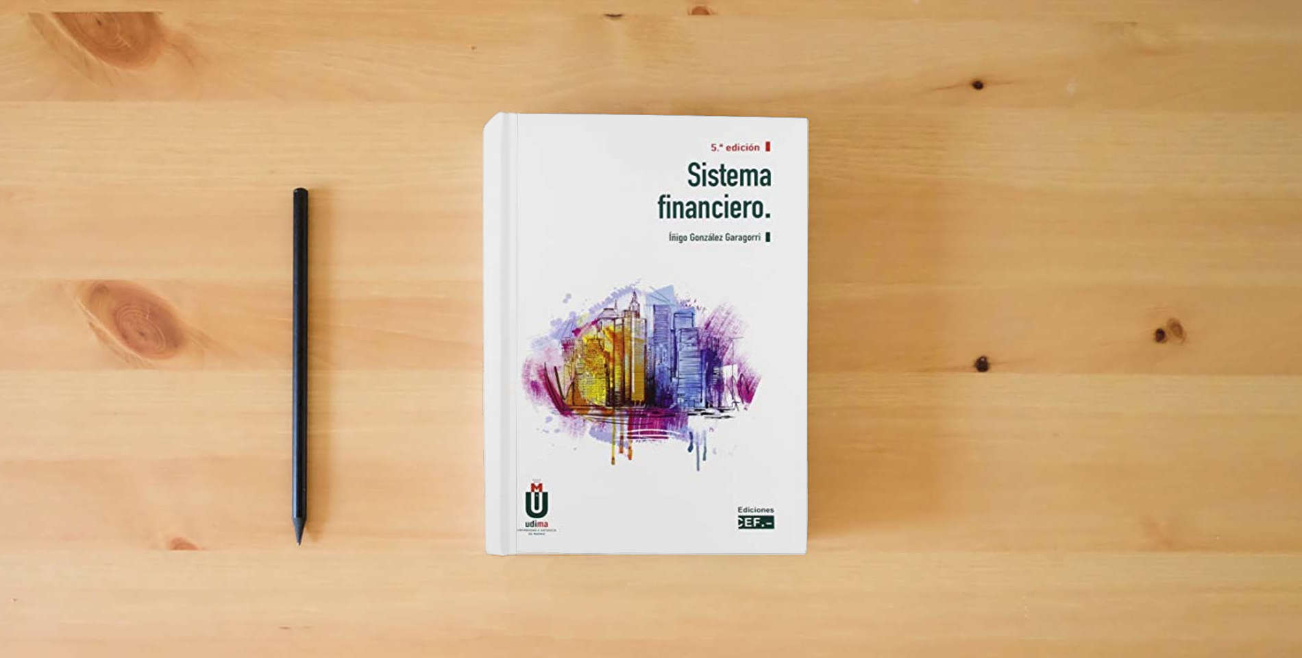 The book Sistema Financiero (SIN COLECCION) is on the table