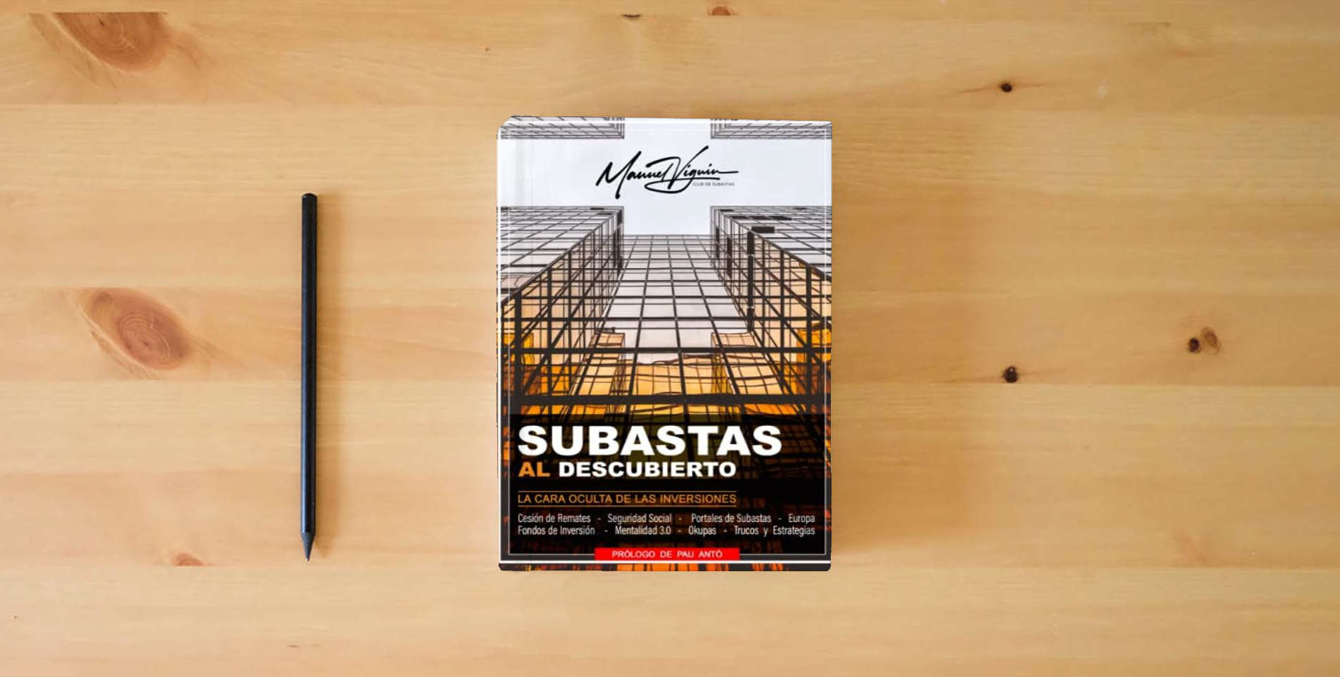 The book SUBASTAS al descubierto: La cara oculta de las inversiones is on the table