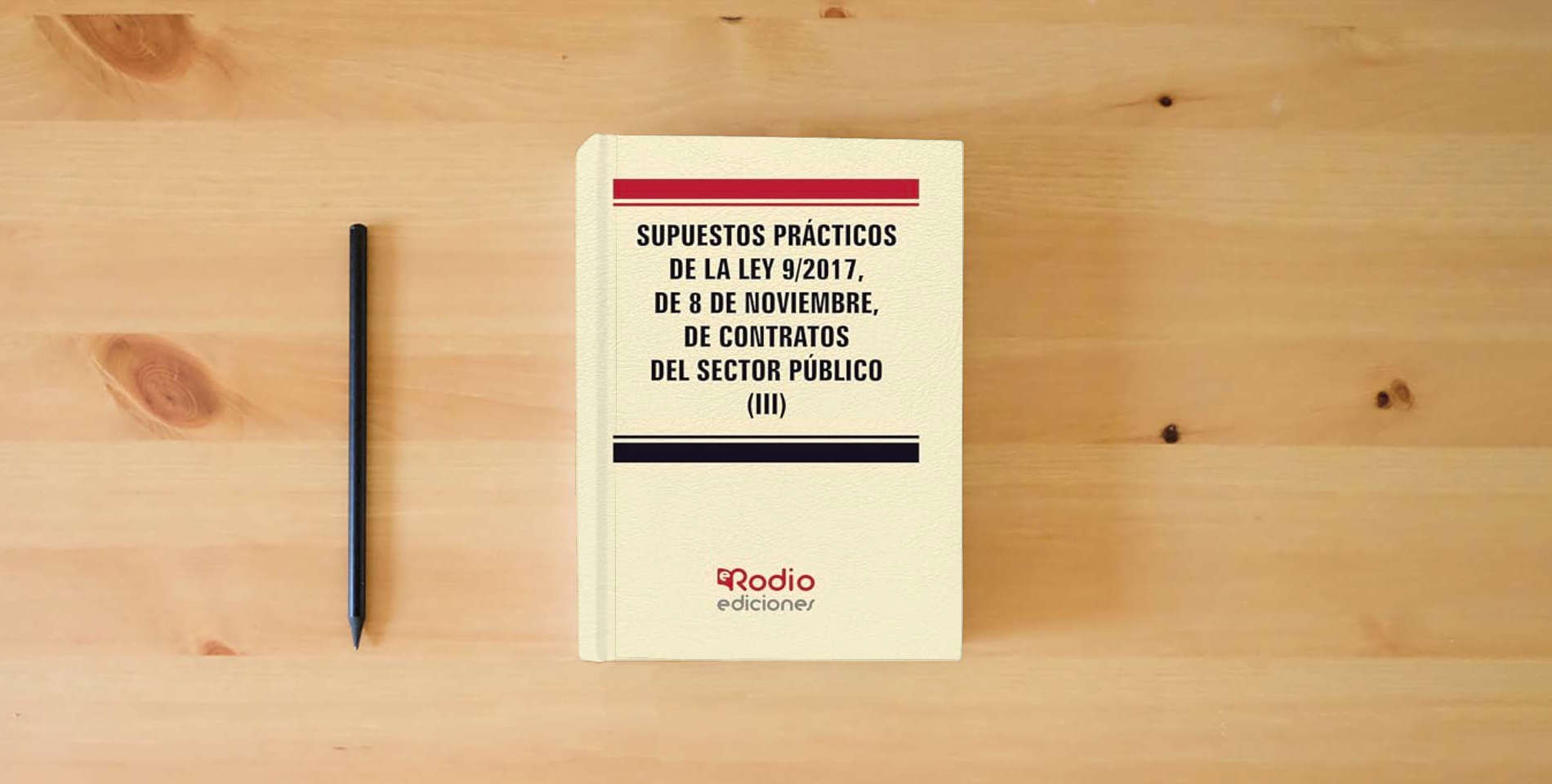 The book Supuestos Prácticos de la Ley 9 2017, de 8 de noviembre, de Contratos del Sector Público (III) (JURIDICA) is on the table