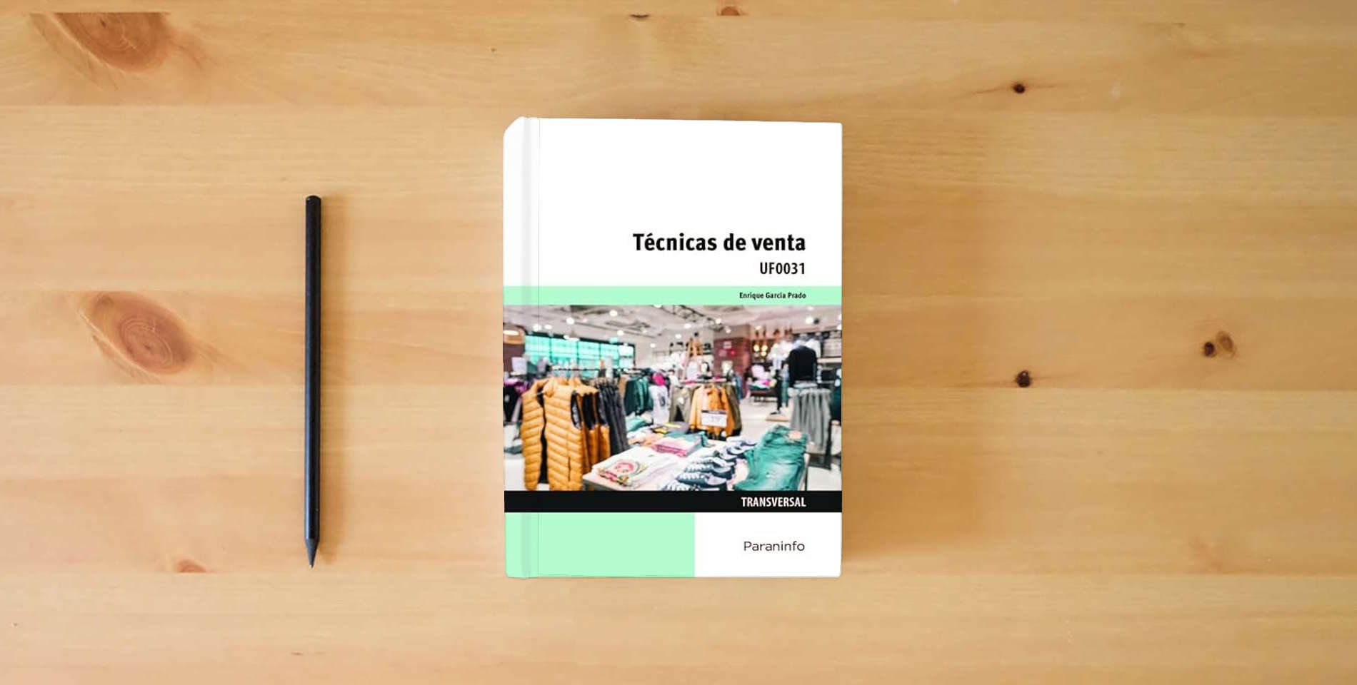 The book Técnicas de venta (Comercio y Marketing) is on the table