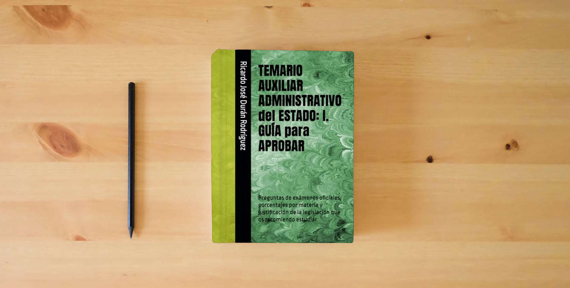 The book TEMARIO AUXILIAR ADMINISTRATIVO del ESTADO: I. GUÍA para APROBAR: Preguntas de exámenes oficiales, porcentajes por materia y justificación de la legislación que os recomiendo estudiar is on the table