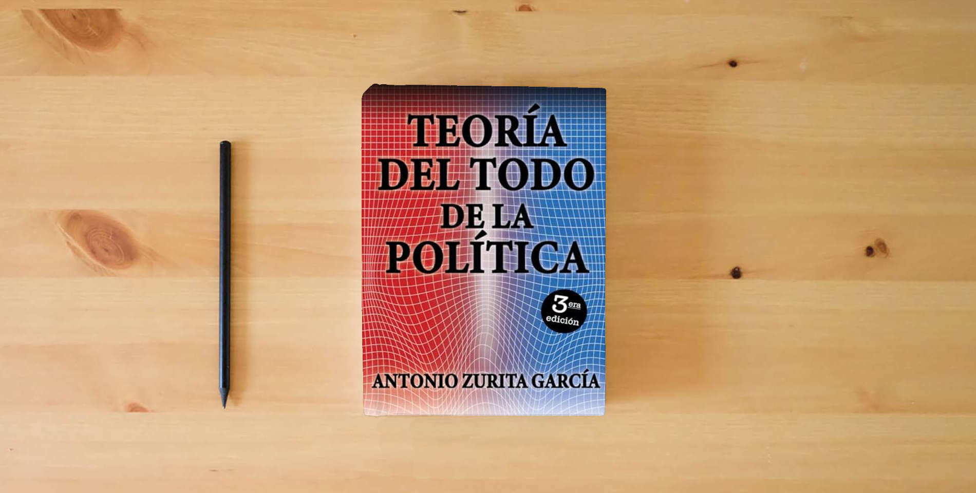 The book Teoría del Todo de la Política is on the table