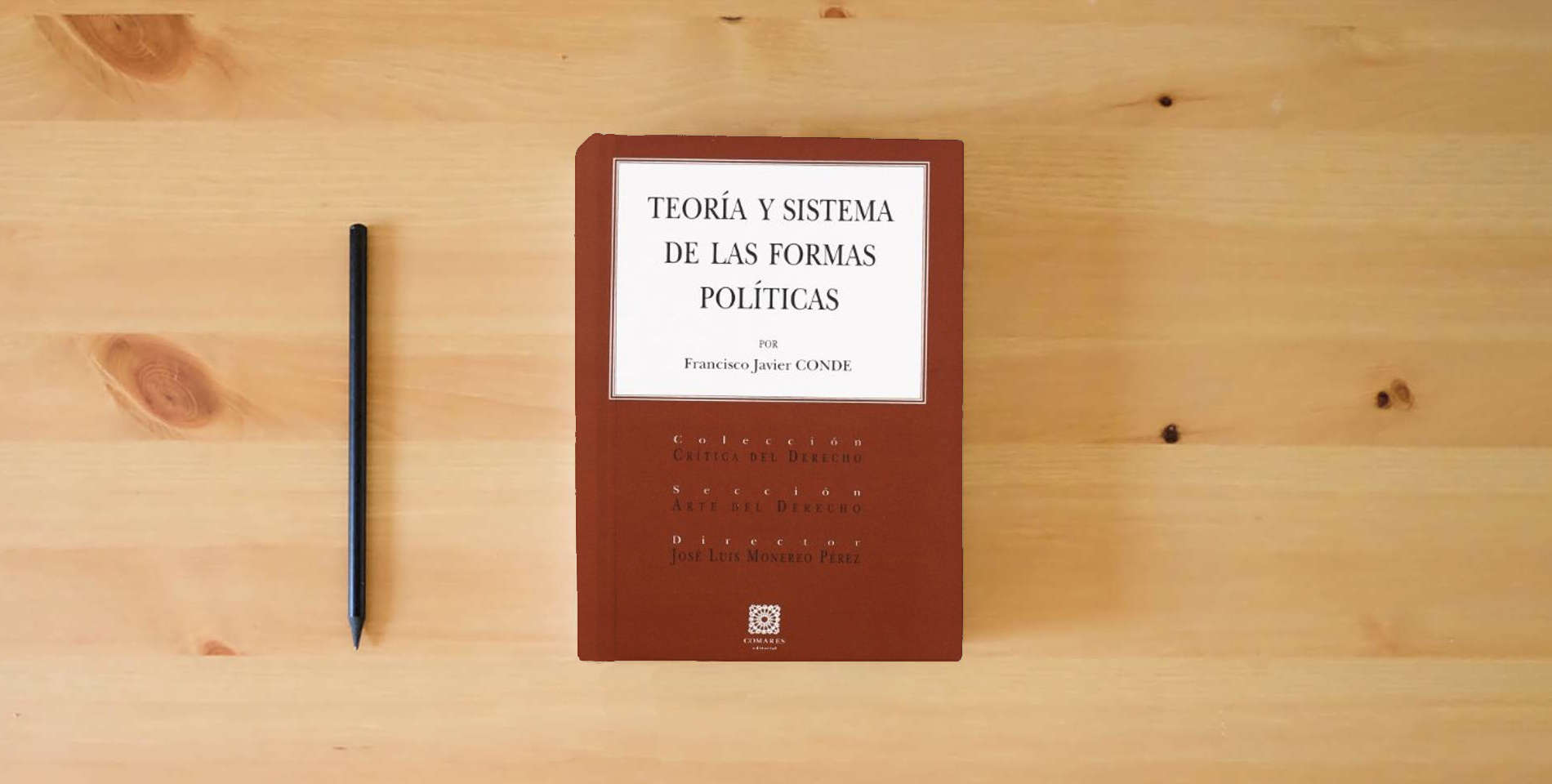 The book TEORIA Y SISTEMA DE LAS FORMAS POLITICAS (SIN COLECCION) is on the table