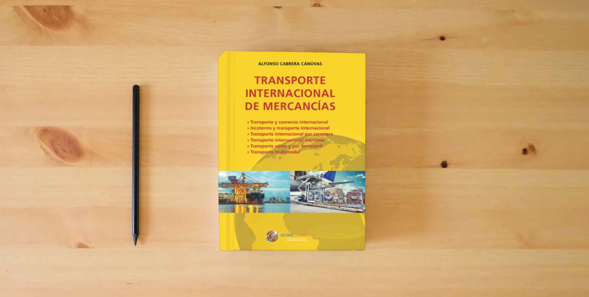 The book Transporte internacional de mercancías (ECONOMIA) is on the table
