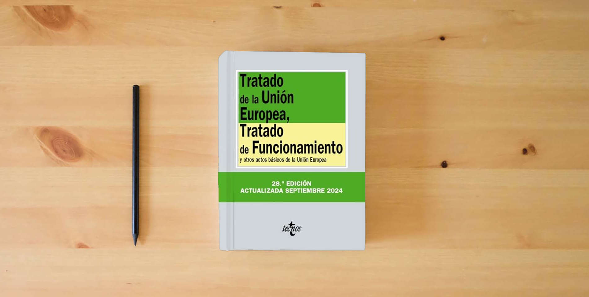 The book Tratado de la Unión Europea, Tratado de Funcionamiento: y otros actos básicos de la Unión Europea (Derecho - Biblioteca de Textos Legales) is on the table