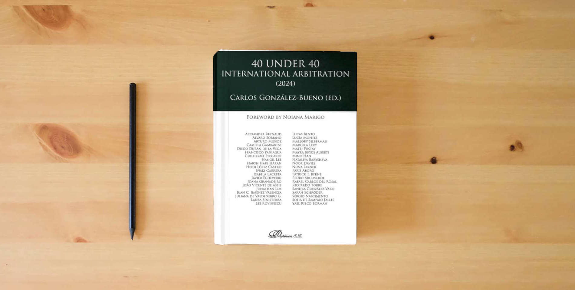 The book 40 under 40 International Arbitration 2024 is on the table