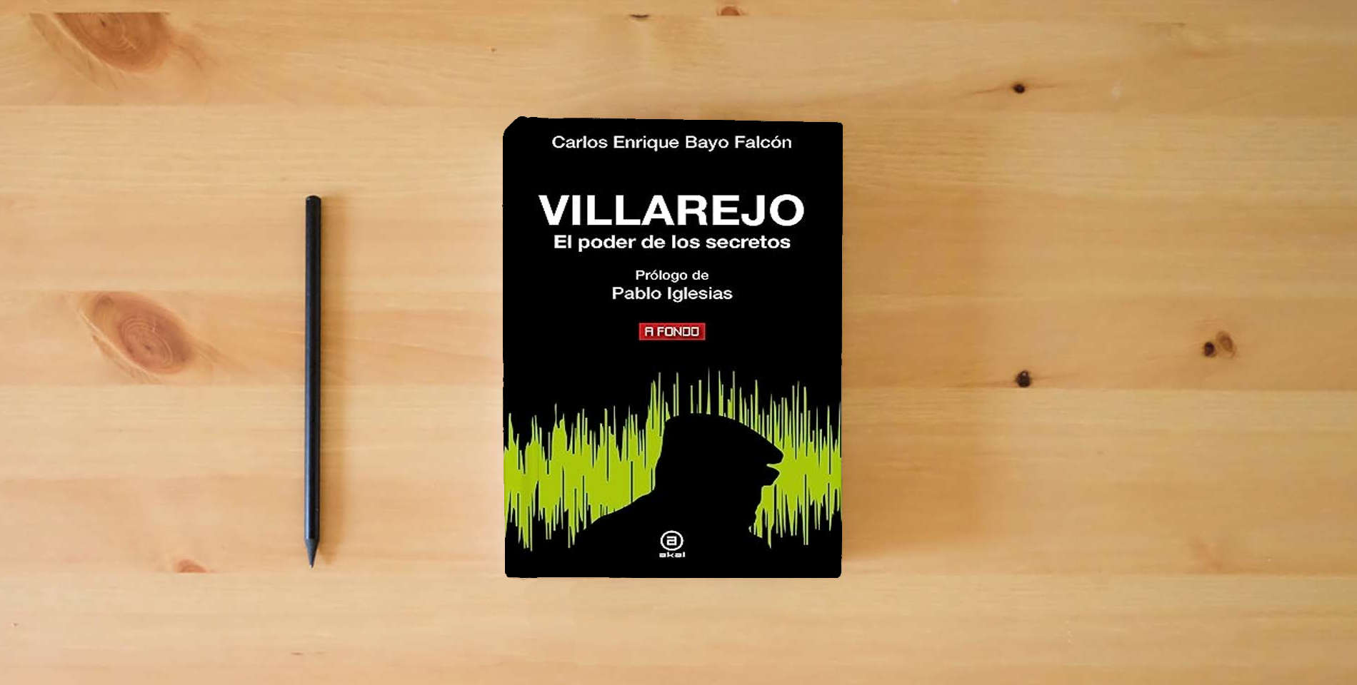 The book Villarejo. El poder de los secretos: 49 (A fondo) is on the table