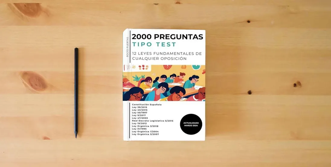The book 2000 preguntas tipo test: 12 leyes fundamentales de cualquier oposición} is on the table