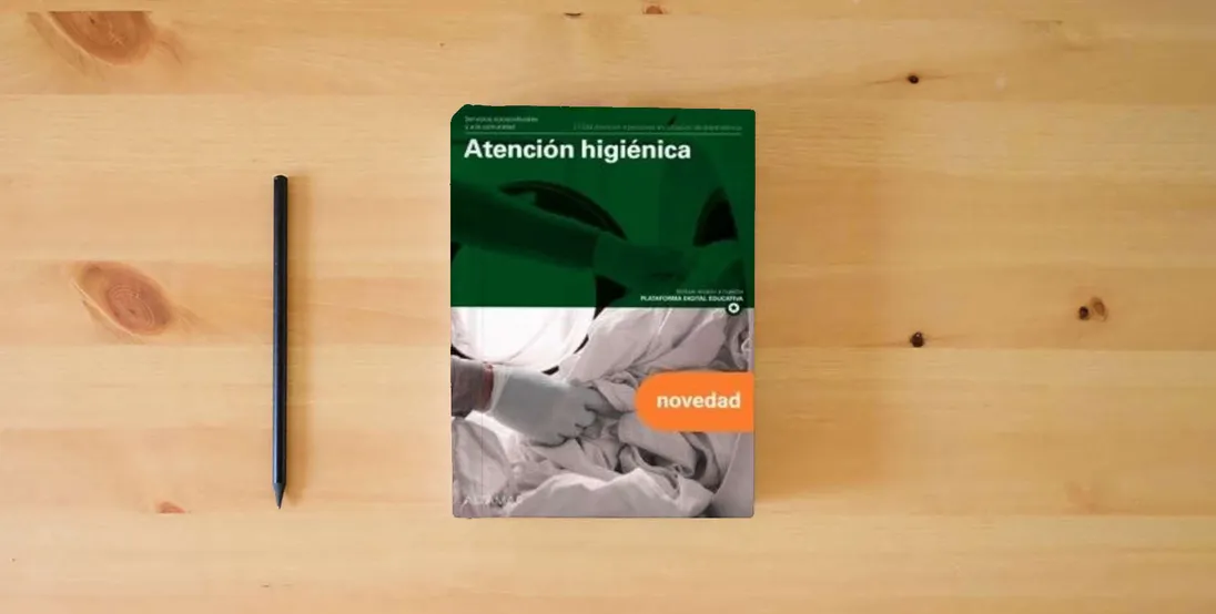 The book ATENCION HIGIENICA GM 25 CF AT.PERSONAS SITUACION (CFGM ATENCIÓN A PERSONAS EN SITUACIÓN DE DEPENDENC)} is on the table