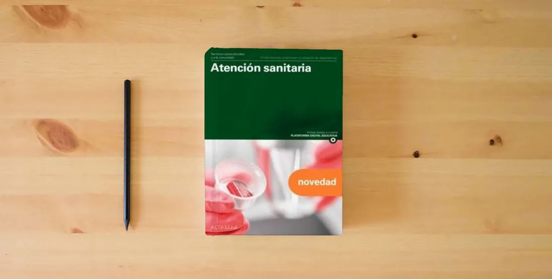 The book ATENCION SANITARIA GM 25 CF AT.PERSONAS SITUACION (CFGM ATENCIÓN A PERSONAS EN SITUACIÓN DE DEPENDENC)} is on the table