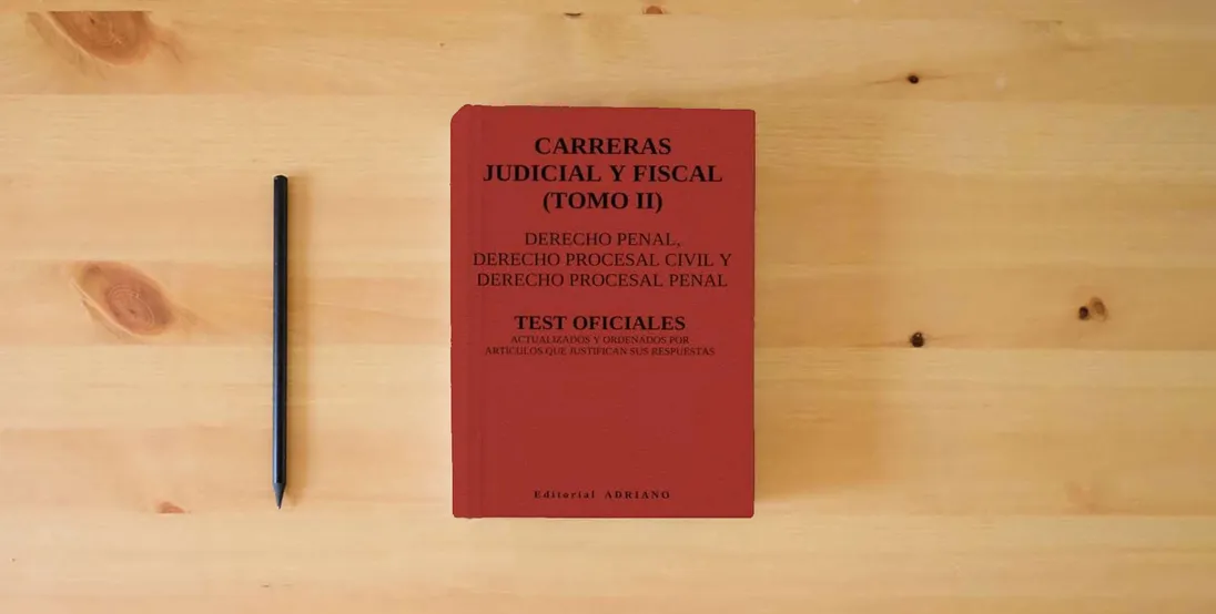 The book Carreras Judicial y Fiscal (Tomo II): Test oficiales actualizados y ordenados por artículos que justifican sus respuestas} is on the table