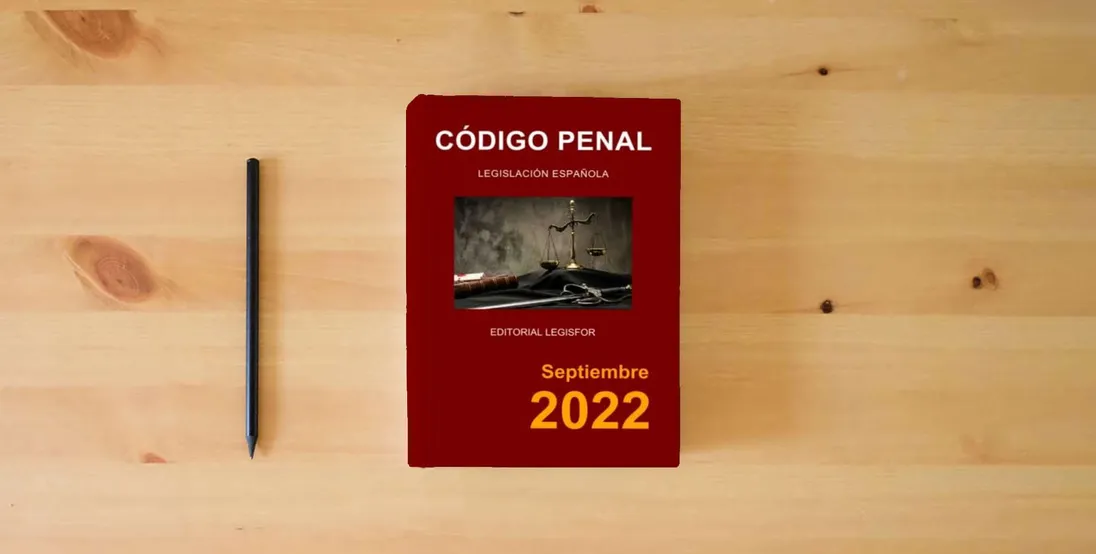 The book Código Penal} is on the table