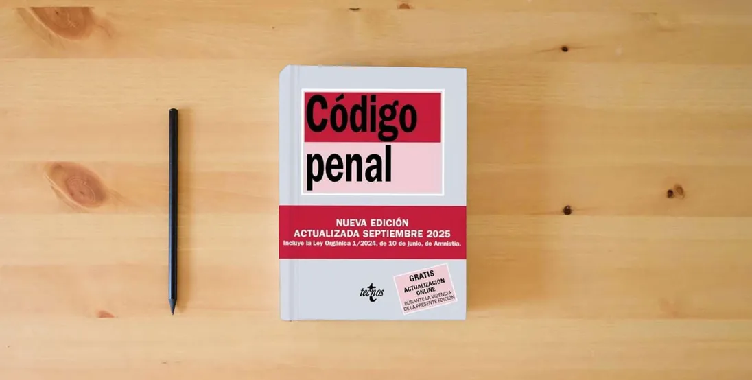 The book Código Penal: Ley Orgánica 10/1995, de 23 de noviembre (Derecho - Biblioteca de Textos Legales)} is on the table