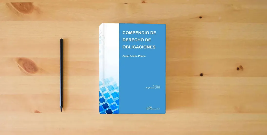 The book Compendio de derecho de obligaciones (SIN COLECCION)} is on the table