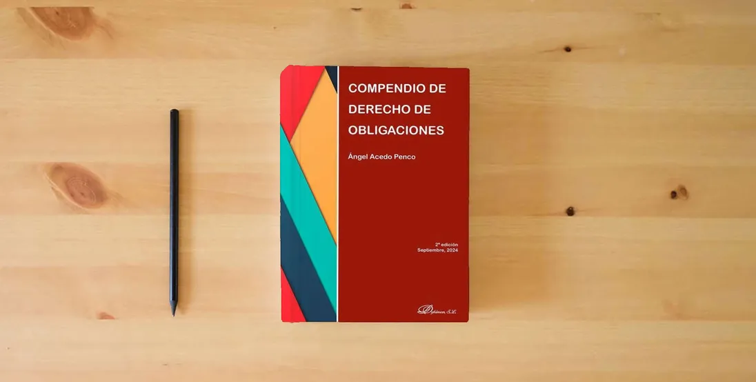 The book Compendio de derecho de obligaciones} is on the table