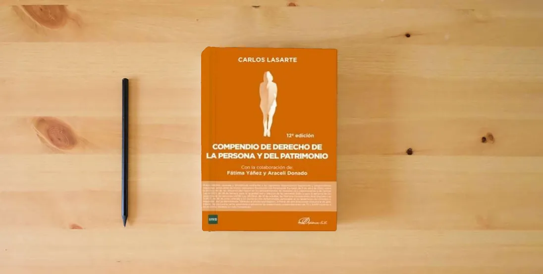 The book Compendio de Derecho de la Persona y del Patrimonio (SIN COLECCION)} is on the table
