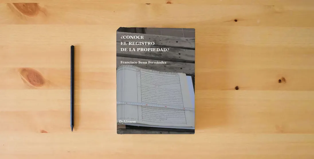 The book ¿Conoce el Registro de la Propiedad? (SIN COLECCION)} is on the table