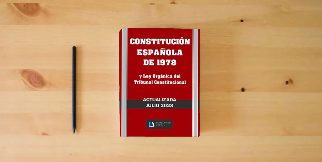 The book CONSTITUCIÓN ESPAÑOLA DE 1978 y Ley Orgánica del Tribunal Constitucional. Actualizada.: Para profesionales, estudiantes y opositores. Tamaño 7”x10”.} is on the table
