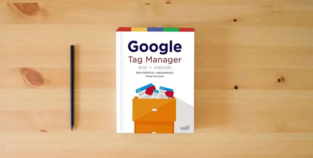 The book Constitución española: derechos y libertades fundamentales} is on the table