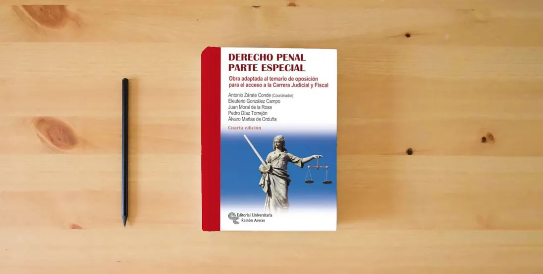 The book Derecho Penal. Parte Especial: Obra adaptada al temario de oposición para el acceso a la Carrera Judicial y Fiscal (Oposición acceso a la Carrera Judicial y Fiscal)} is on the table